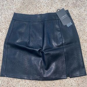 Brand new leather mini skirt with slit